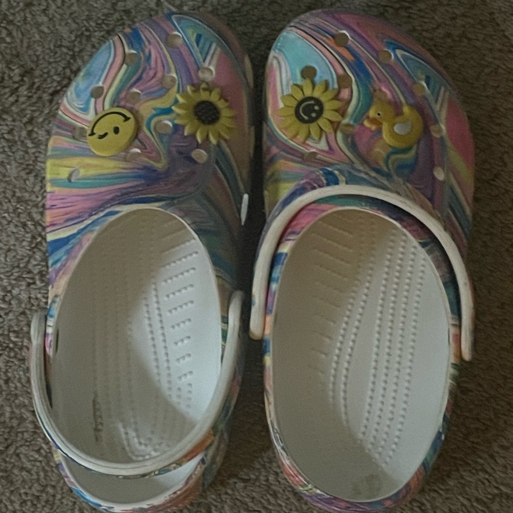 Multi color Crocs. Men size 5 women size 7